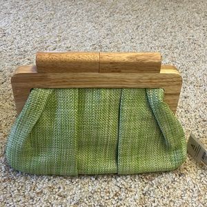 Beautiful mint clutch purse with wooden closure. NWT.